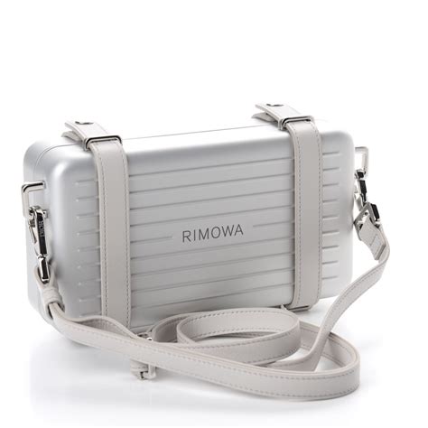 rimowa clutch dior|christian dior silver strap clutch.